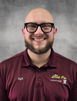 Staff member Kyle Wolfe from 7291a8f24304