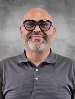 Staff member Luis Munoz from 7291a8f24304