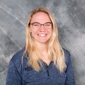 Staff member Brooke Tomkins from 8a8ea7f81173