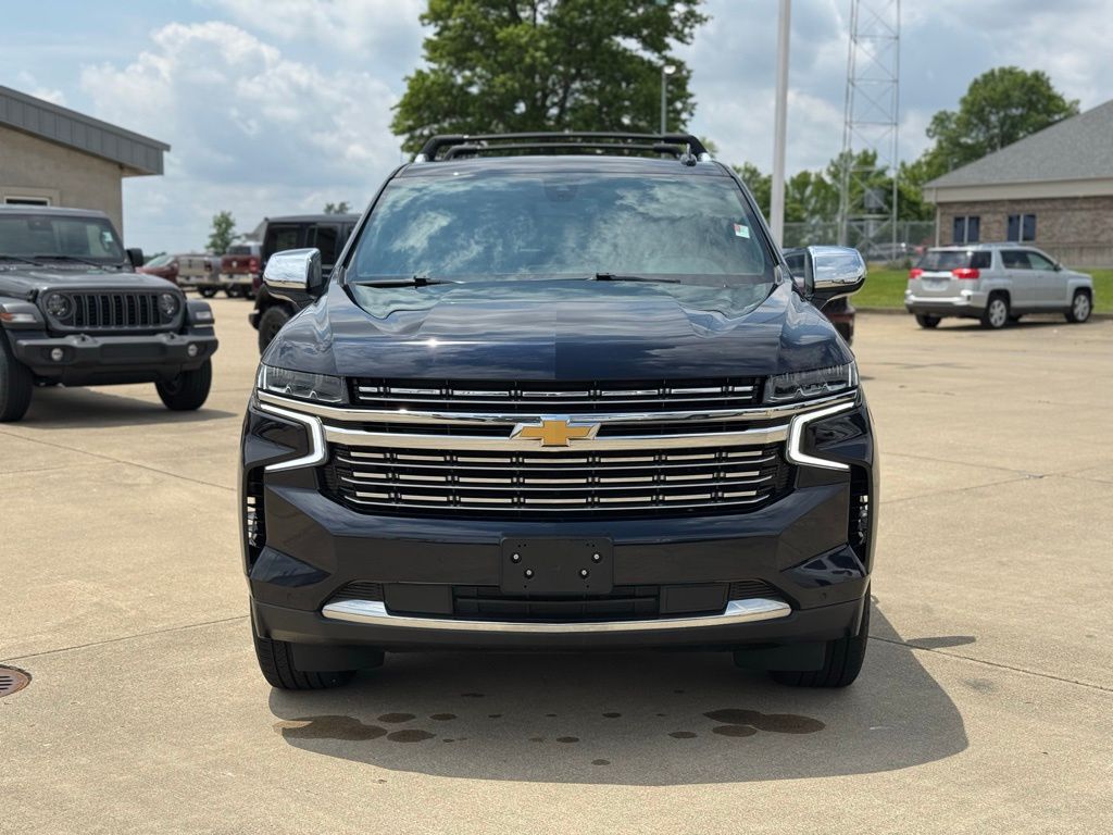 Used 2021 Chevrolet Tahoe Premier with VIN 1GNSKSKD2MR206704 for sale in Paris, IL