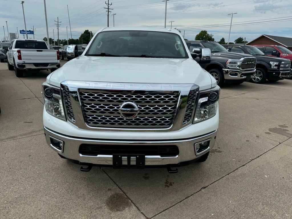 Used 2016 Nissan Titan XD SL with VIN 1N6BA1F43GN501769 for sale in Paris, IL