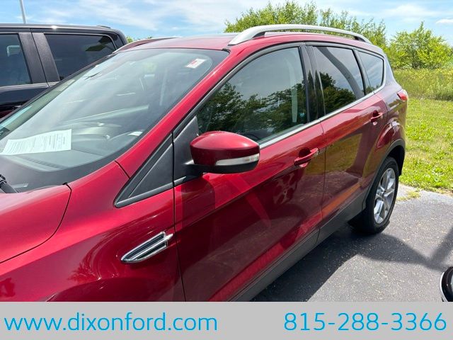 Used 2014 Ford Escape Titanium with VIN 1FMCU9J93EUC82455 for sale in Dixon, IL