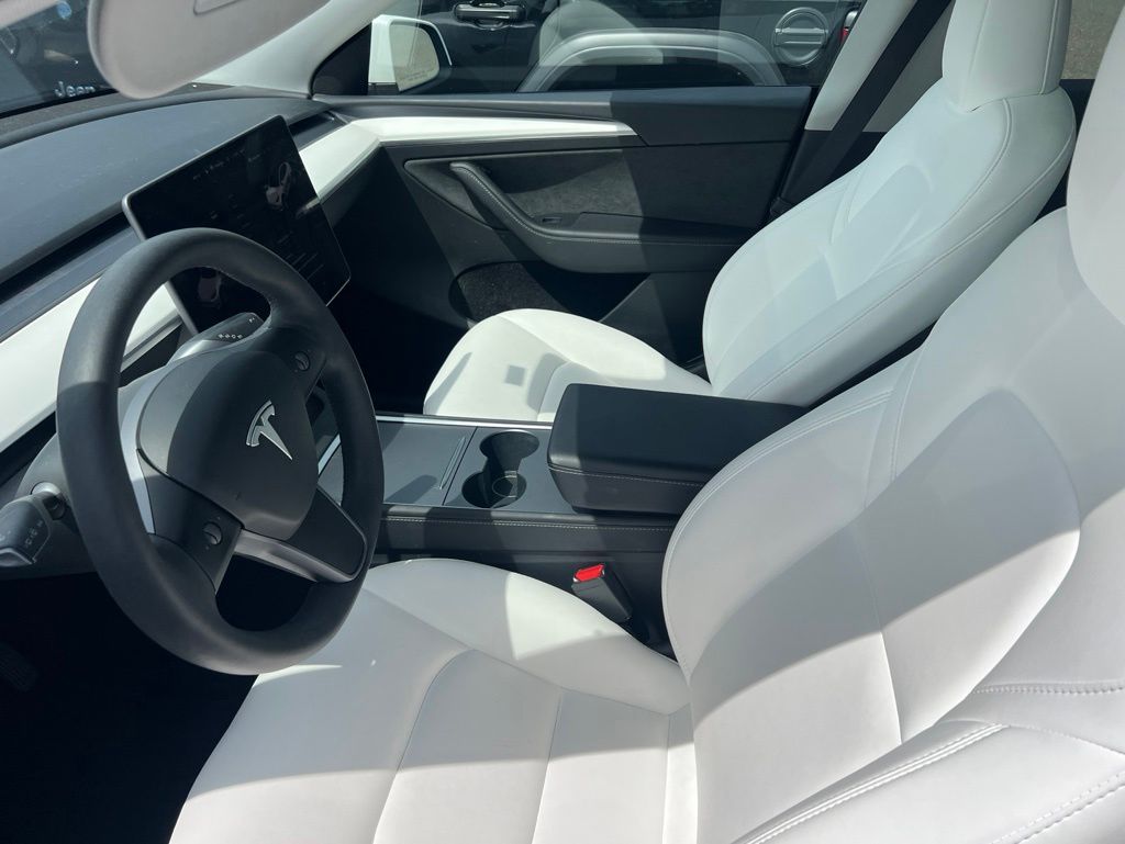 Used 2024 Tesla Model Y Long Range with VIN 7SAYGDEE6RF014304 for sale in Seattle, WA