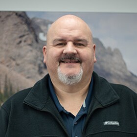 Staff member JAMES GILL from ID_750c3f