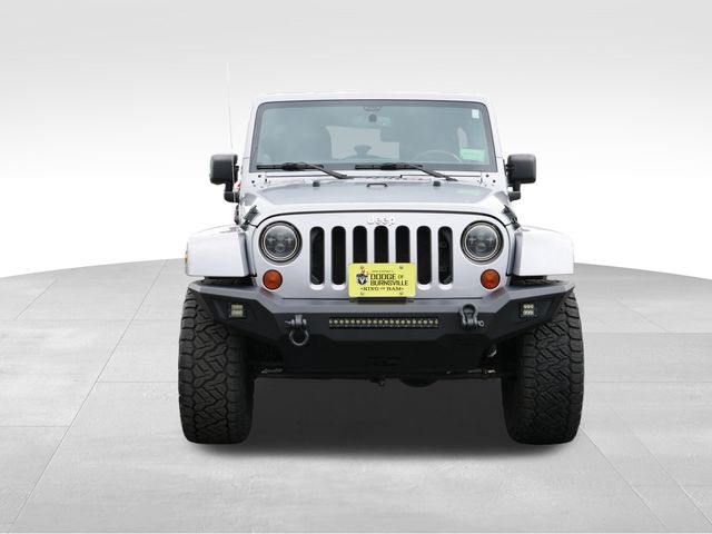 Used 2013 Jeep Wrangler Unlimited Sahara with VIN 1C4BJWEG5DL652518 for sale in Burnsville, Minnesota