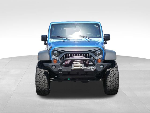 Used 2010 Jeep Wrangler Unlimited Sport with VIN 1J4BA3H13AL136945 for sale in Burnsville, Minnesota