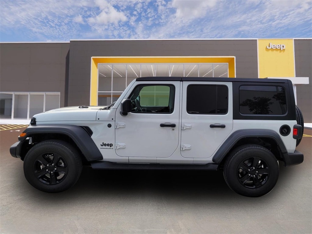 Used 2023 Jeep Wrangler 4-Door Altitude with VIN 1C4HJXDN6PW655639 for sale in Mckinney, TX