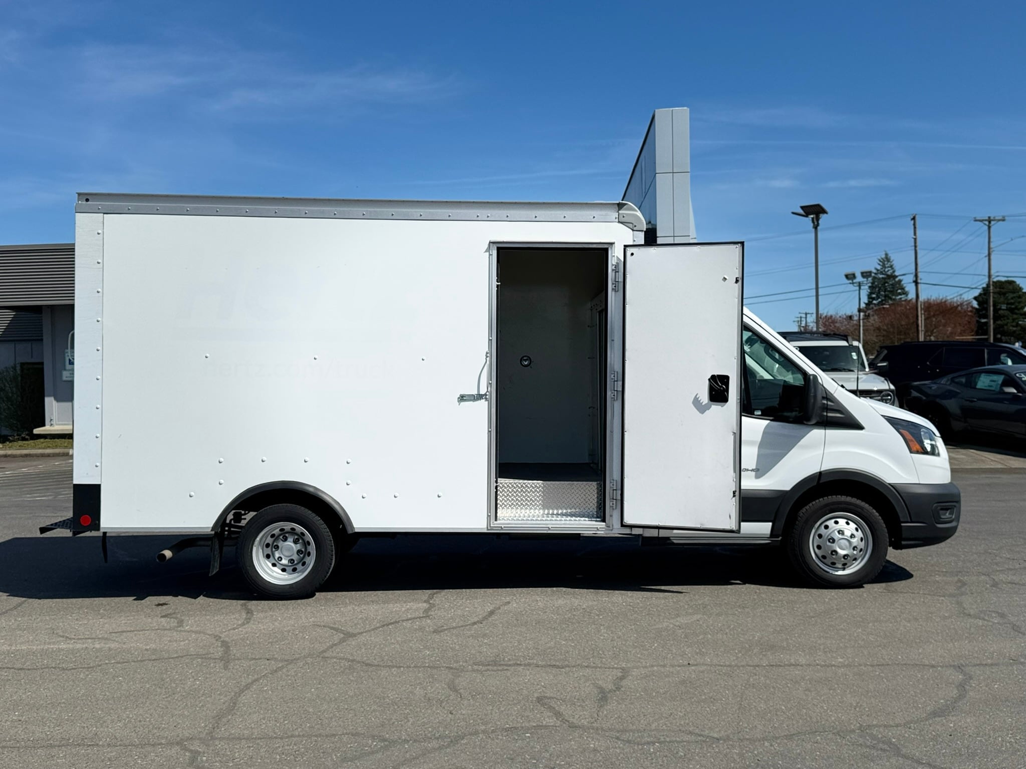 View vehicle photo 3