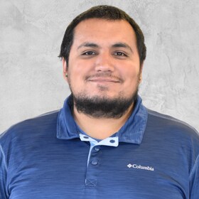 Staff member Oscar Baltazar from 7b0dd36c80d3
