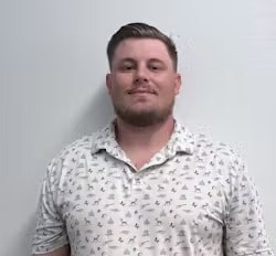 Staff member Brett Guy from ID_378195