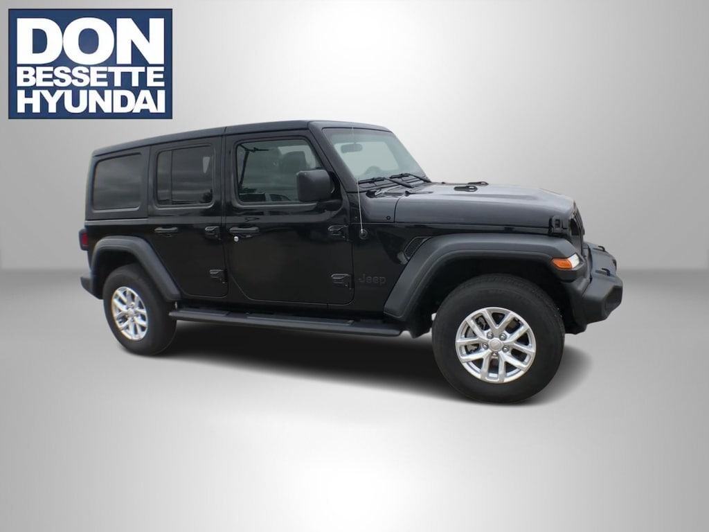 Used 2023 Jeep Wrangler 4-Door Sport S with VIN 1C4HJXDN2PW643164 for sale in Minot, ND