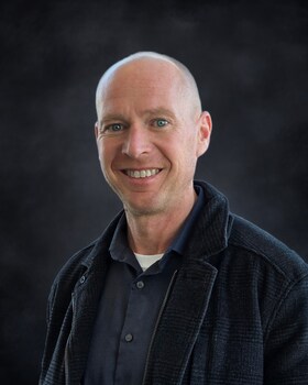 Staff member Larry Smekofske from fb8e2030577e