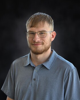 Staff member Cyrus Bailey from 80f4ec81c3cd