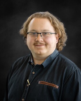 Staff member Zach Hansen from fb8e2030577e