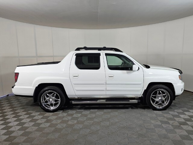 Used 2014 Honda Ridgeline RTL with VIN 5FPYK1F51EB002572 for sale in Brainerd, Minnesota