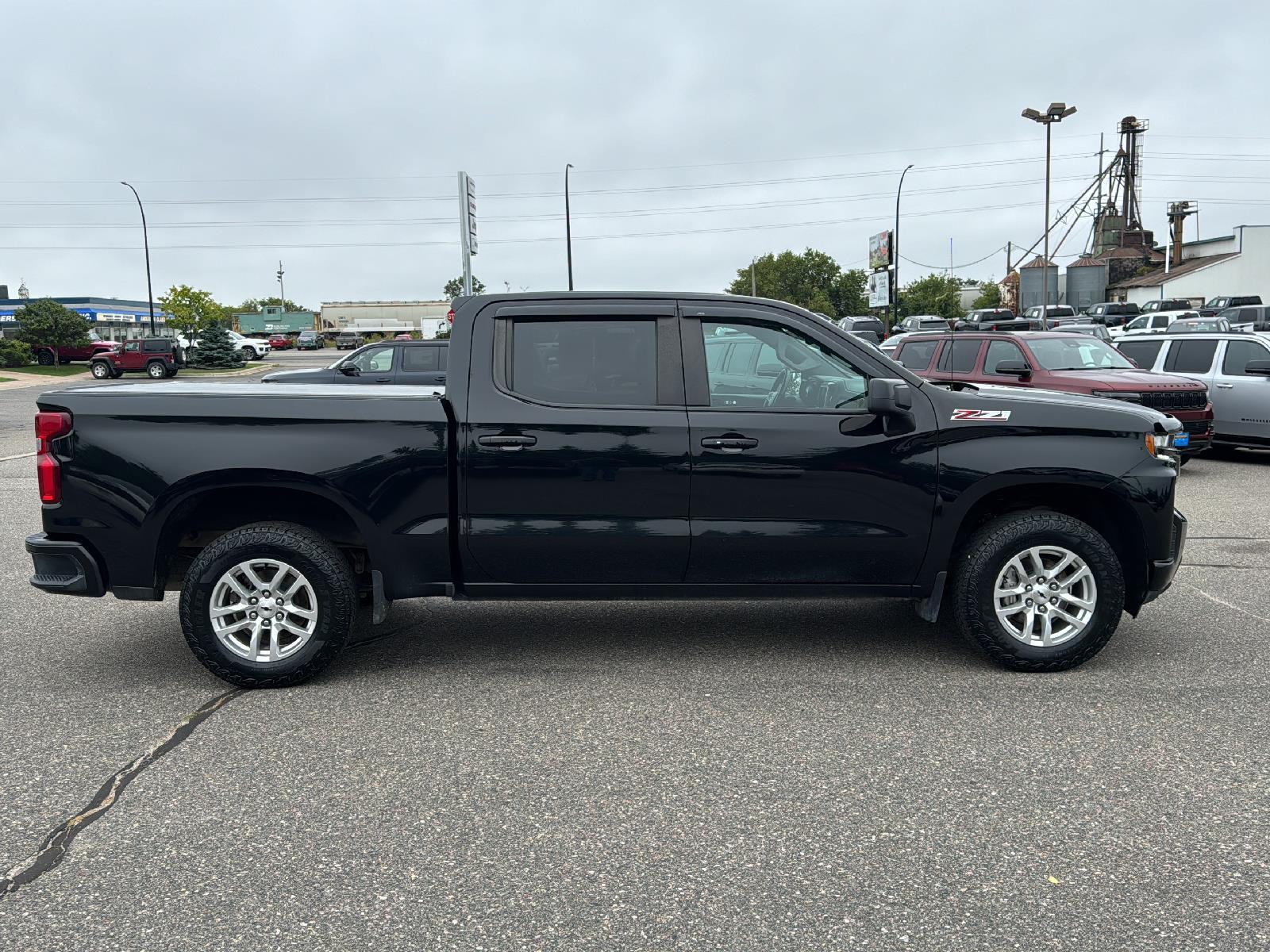 Used 2021 Chevrolet Silverado 1500 RST with VIN 3GCUYEED7MG286790 for sale in Grand Rapids, MN