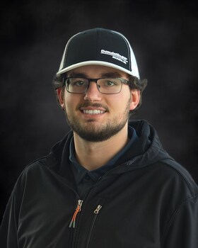 Staff member Caleb Hughes from b157c26baf6c