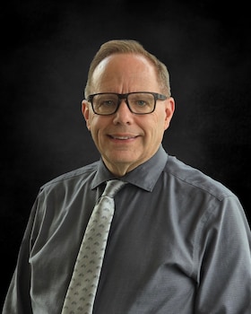 Staff member Brian Larson from 882069391438