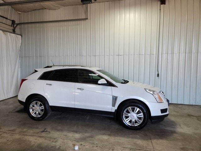 Used 2014 Cadillac SRX Luxury Collection with VIN 3GYFNEE33ES520764 for sale in Baraboo, WI