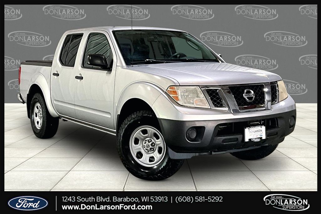 Silver Lightning Metallic 2011 Nissan Frontier Pickup Truck 4X2 6-Speed Manual Overdrive