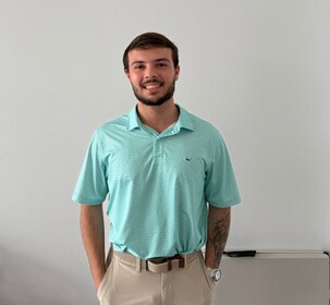 Staff member Sam Bain from 590f4270ba15
