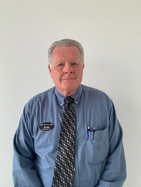 Staff member John Yow from 08d579cab229