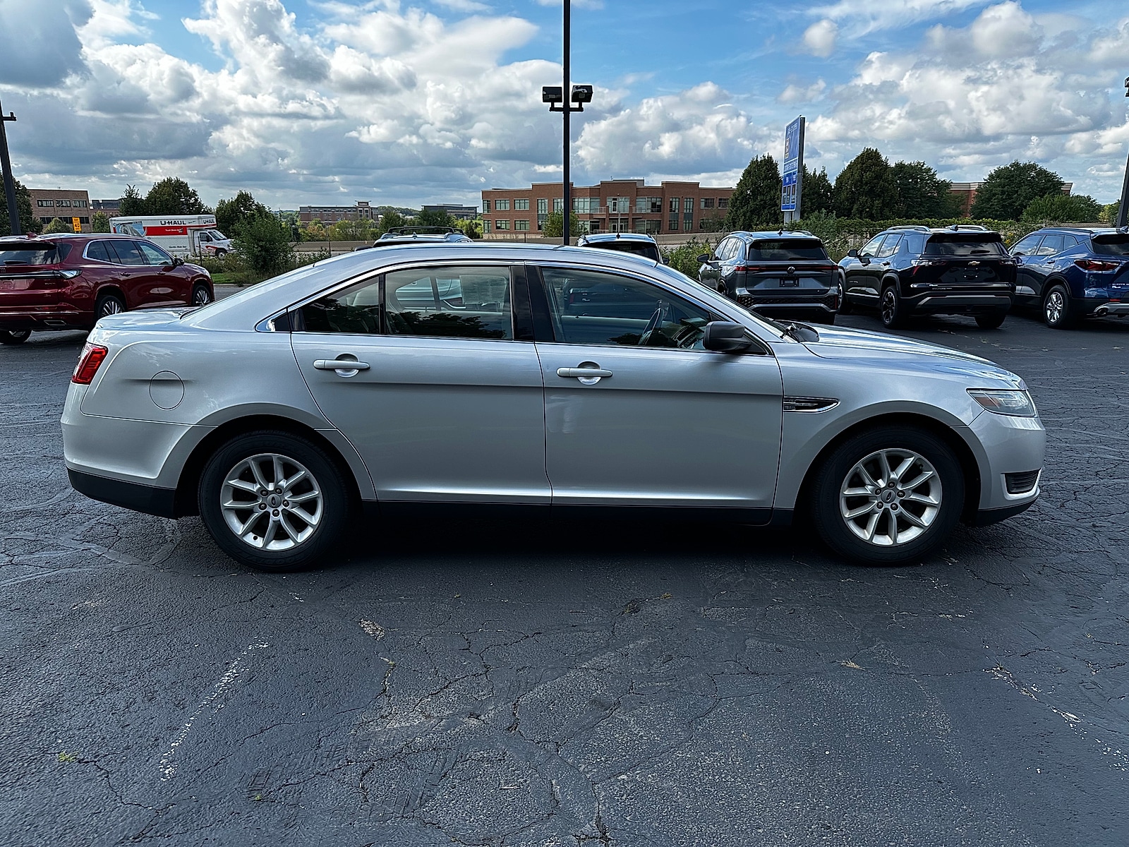 Used 2013 Ford Taurus SE with VIN 1FAHP2D8XDG191892 for sale in Madison, WI
