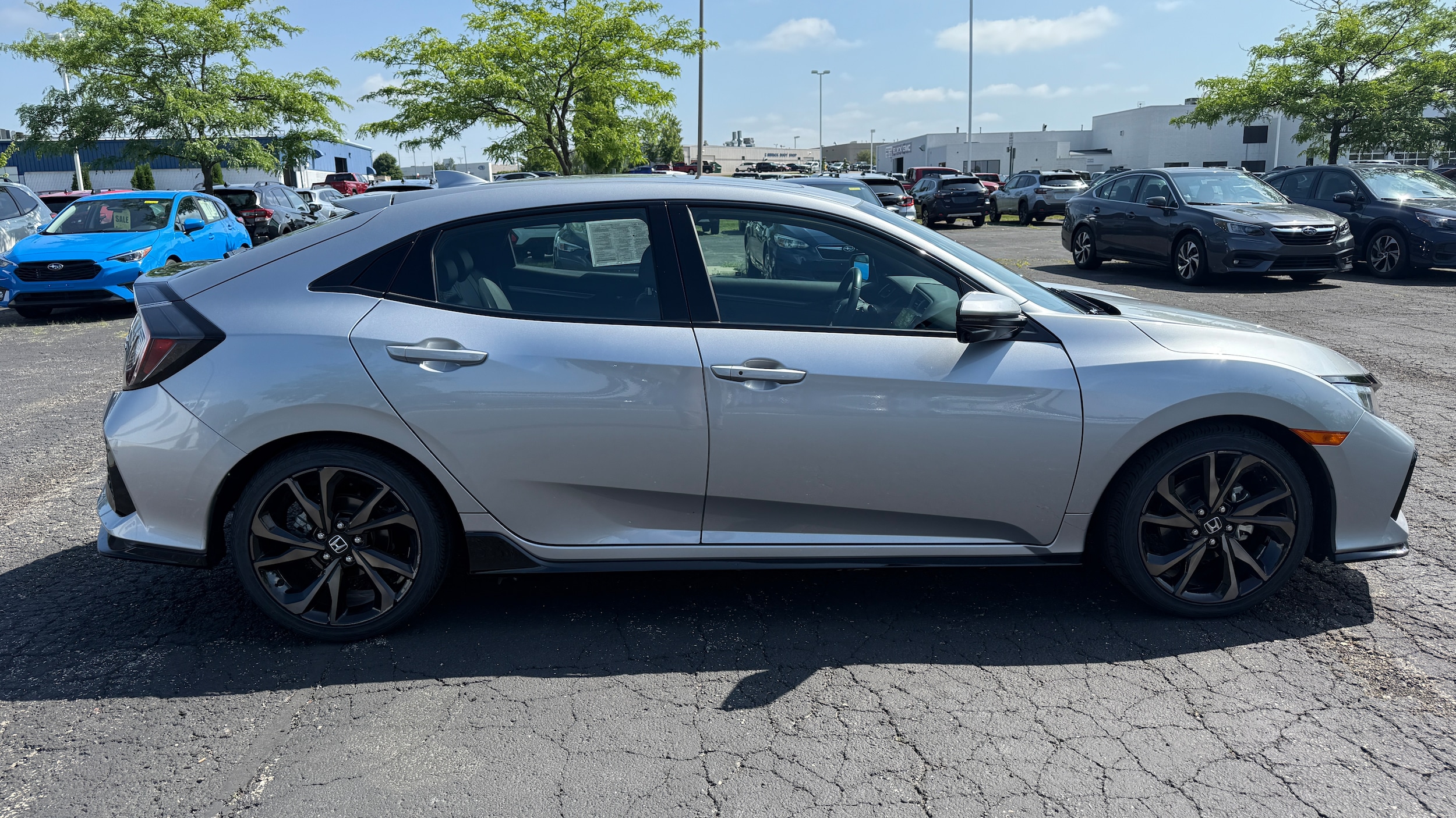 Used 2017 Honda Civic Hatchback Sport Touring with VIN SHHFK7H92HU232627 for sale in Madison, WI