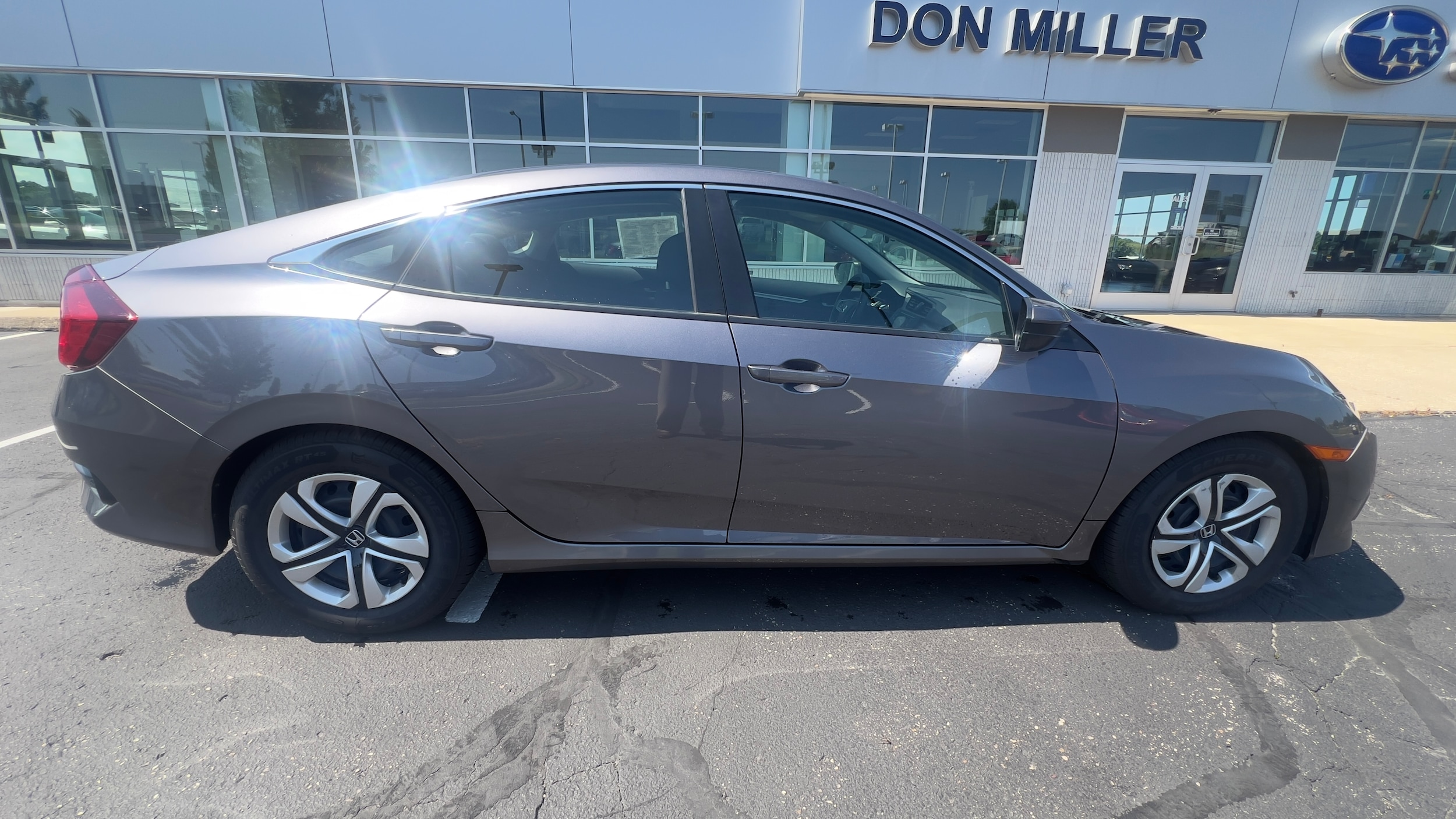 Used 2018 Honda Civic LX with VIN 19XFC2F57JE035031 for sale in Madison, WI