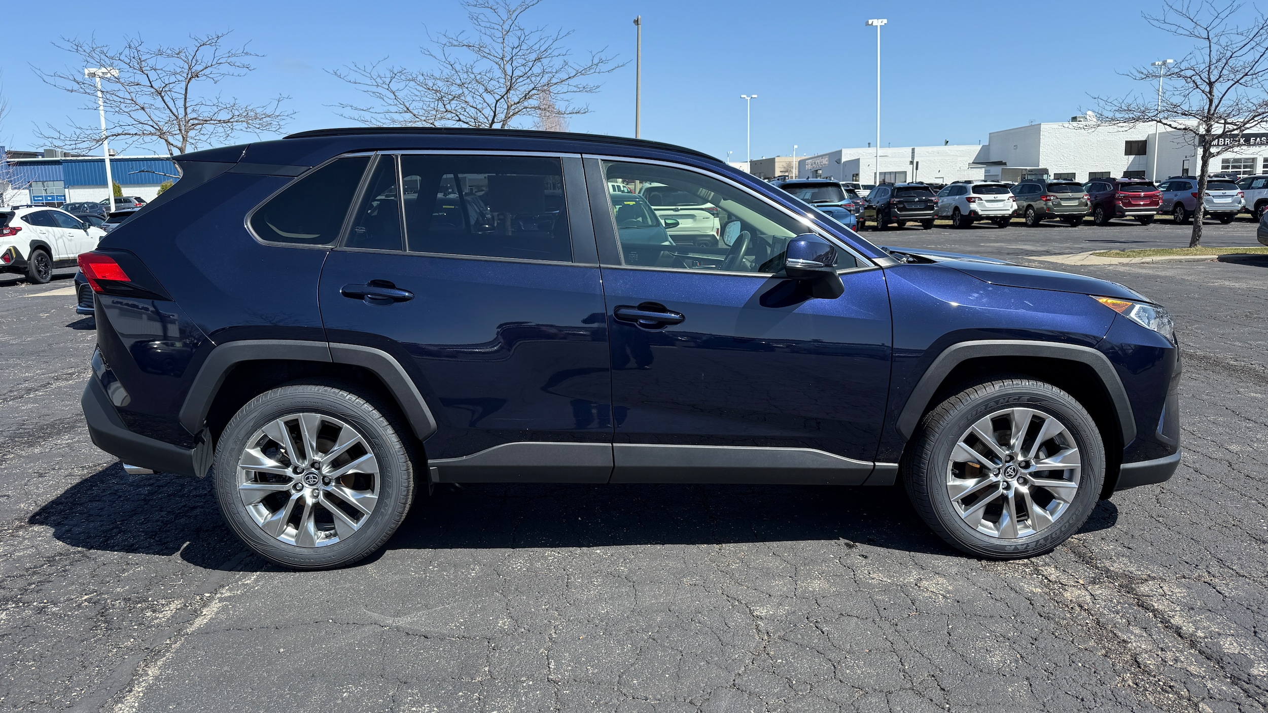 Used 2021 Toyota RAV4 XLE Premium with VIN JTMA1RFV8MD076394 for sale in Madison, WI