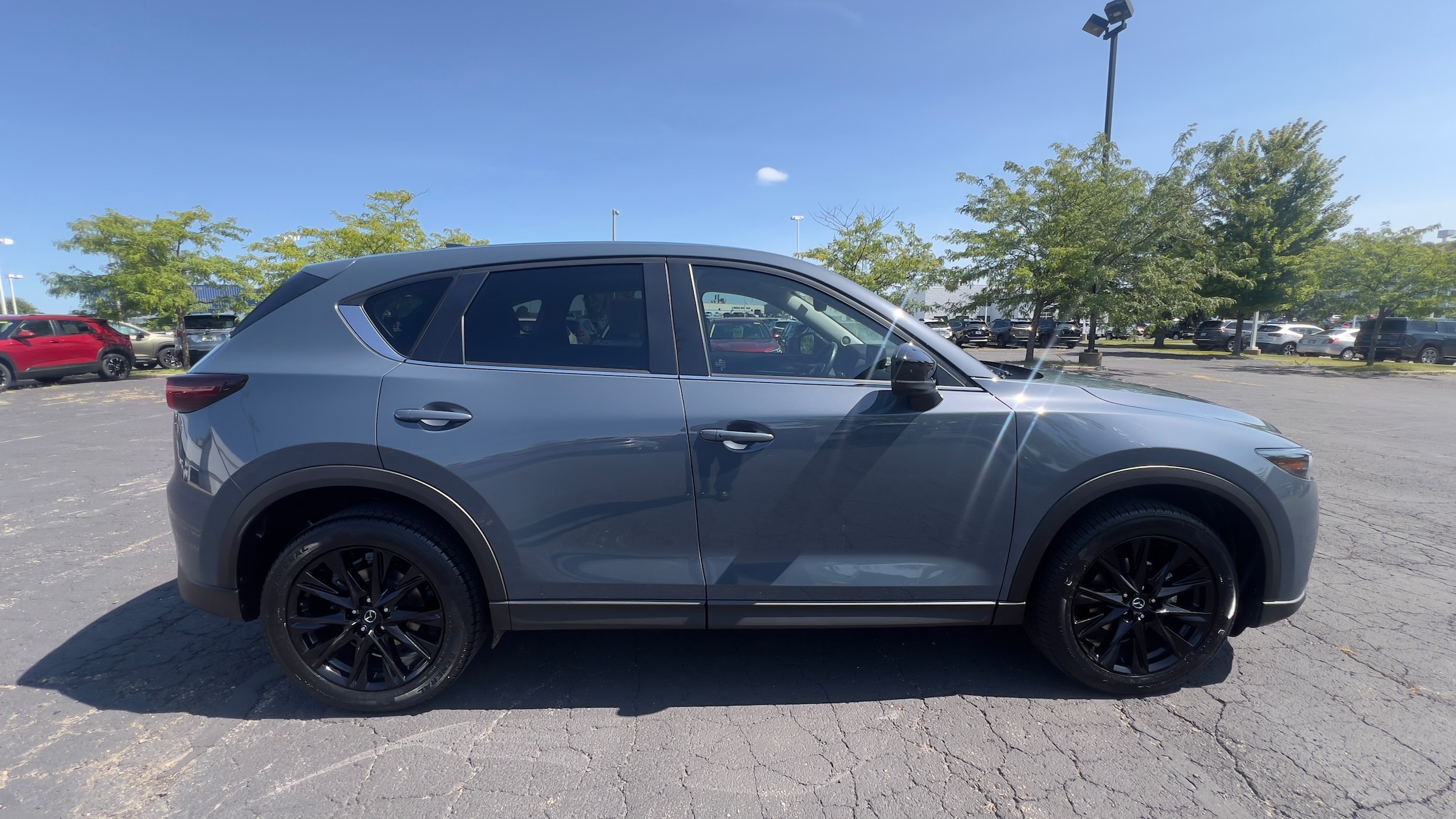 Used 2022 Mazda CX-5 S Carbon Edition with VIN JM3KFBCM3N0526848 for sale in Madison, WI