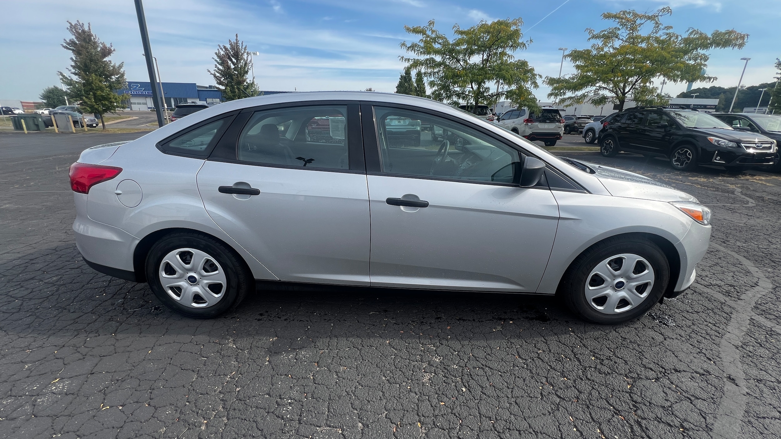 Used 2016 Ford Focus S with VIN 1FADP3E27GL318544 for sale in Madison, WI