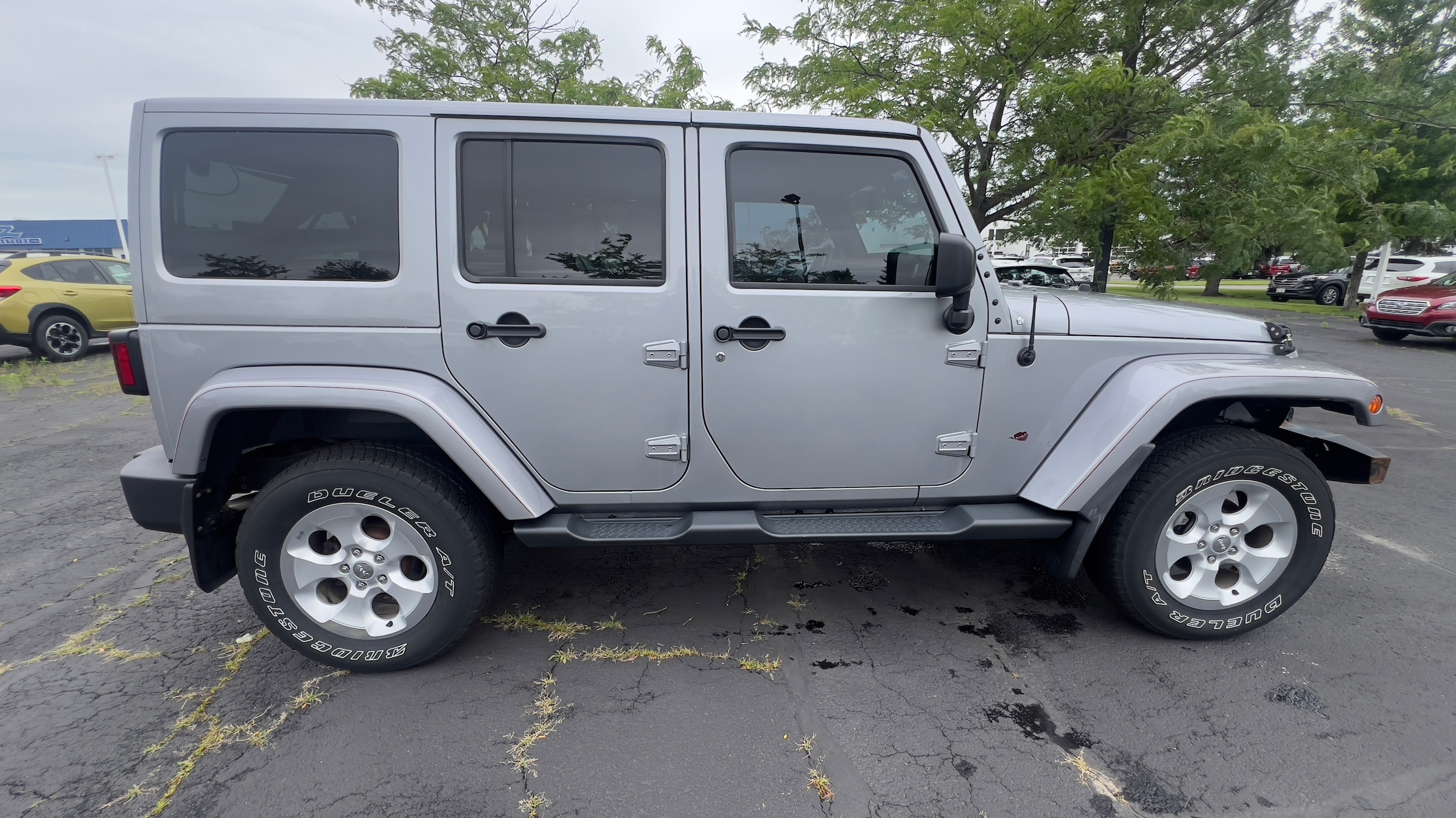 Used 2015 Jeep Wrangler Unlimited Sahara with VIN 1C4BJWEG3FL531294 for sale in Madison, WI