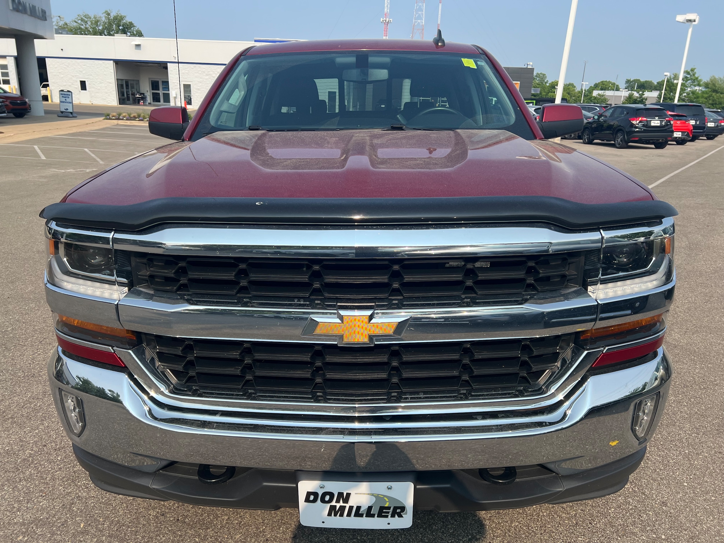Used 2018 Chevrolet Silverado 1500 LT with VIN 3GCUKREC3JG201066 for sale in Madison, WI