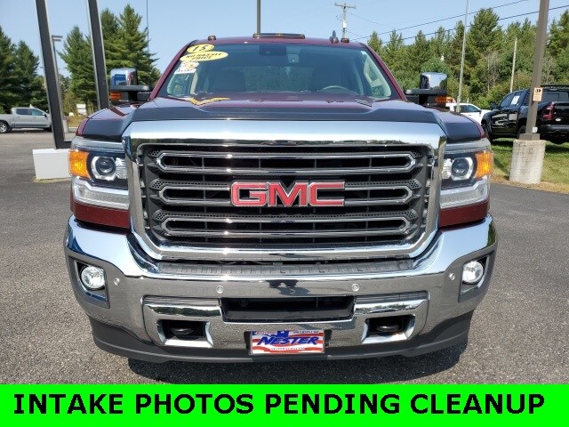 Used 2015 GMC Sierra 2500HD SLT with VIN 1GT22ZEG5FZ530997 for sale in Roscommon, MI