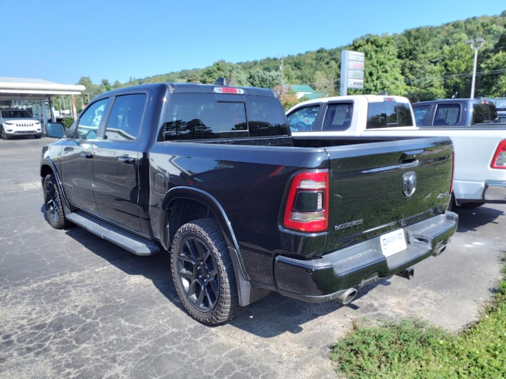 Used 2021 RAM Ram 1500 Pickup Laramie with VIN 1C6SRFJT1MN517589 for sale in Titusville, PA