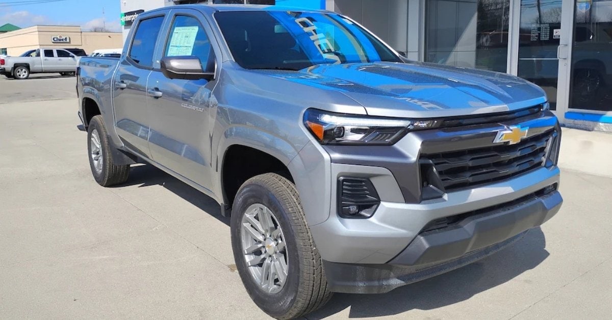 Gray 2026 Chevrolet Colorado crew cab pickup truck parked at Don's Chevrolet GMC, a Chevrolet dealership in Wauseon, OH, photographed from a front three-quarter angle on a clear day.