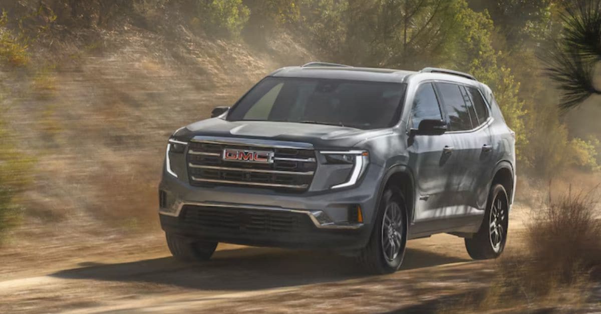 Driving Silver GMC Acadia