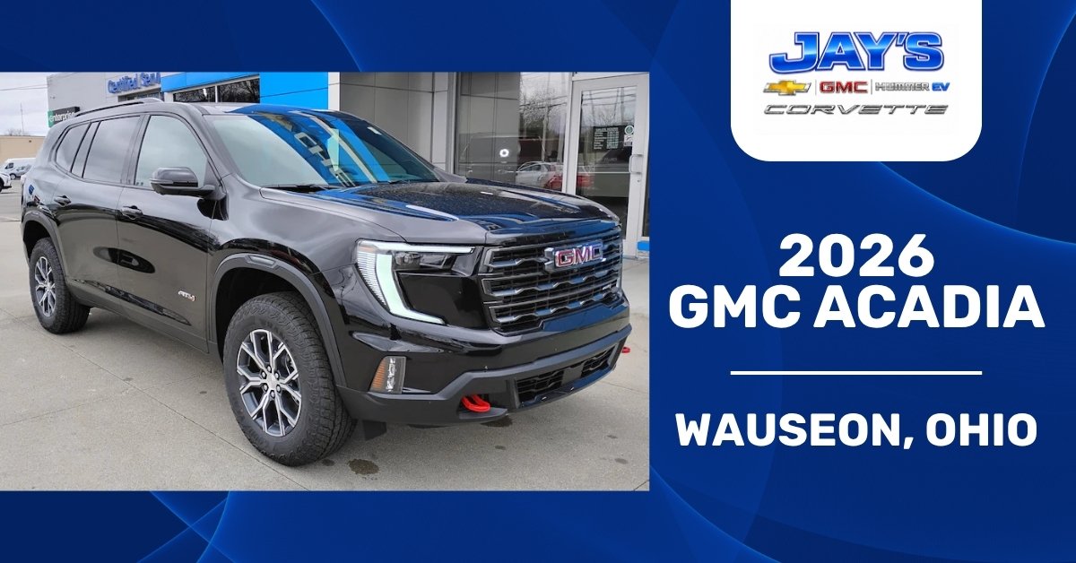 Promotional image showing a black 2026 GMC Acadia AT4 parked at Jay's Chevrolet GMC dealership in front of a modern showroom. A dark blue panel on the right displays Jay’s dealership branding, the text “2026 GMC Acadia,” and the location “Wauseon, Ohio.”