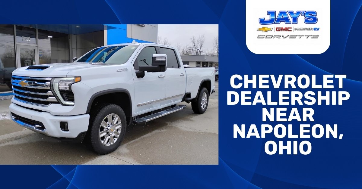 Promotional graphic featuring a white 2026 Chevrolet Silverado 2500 HD High Country pickup truck parked outside Jay's Chevrolet GMC, alongside bold text reading “Chevrolet Dealership Near Napoleon, Ohio” and Jay’s dealership branding.