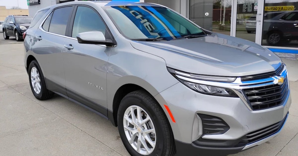 Silver 2024 Chevrolet Equinox SUV parked at Don's Chevrolet GMC, a Chevrolet dealership in Wauseon, OH, shown from a front-side angle with chrome accents and alloy wheels.