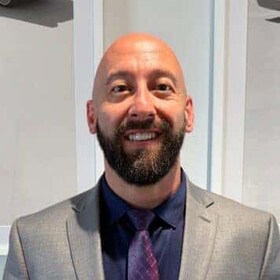 Staff member Travis Graham from ID_ed6503