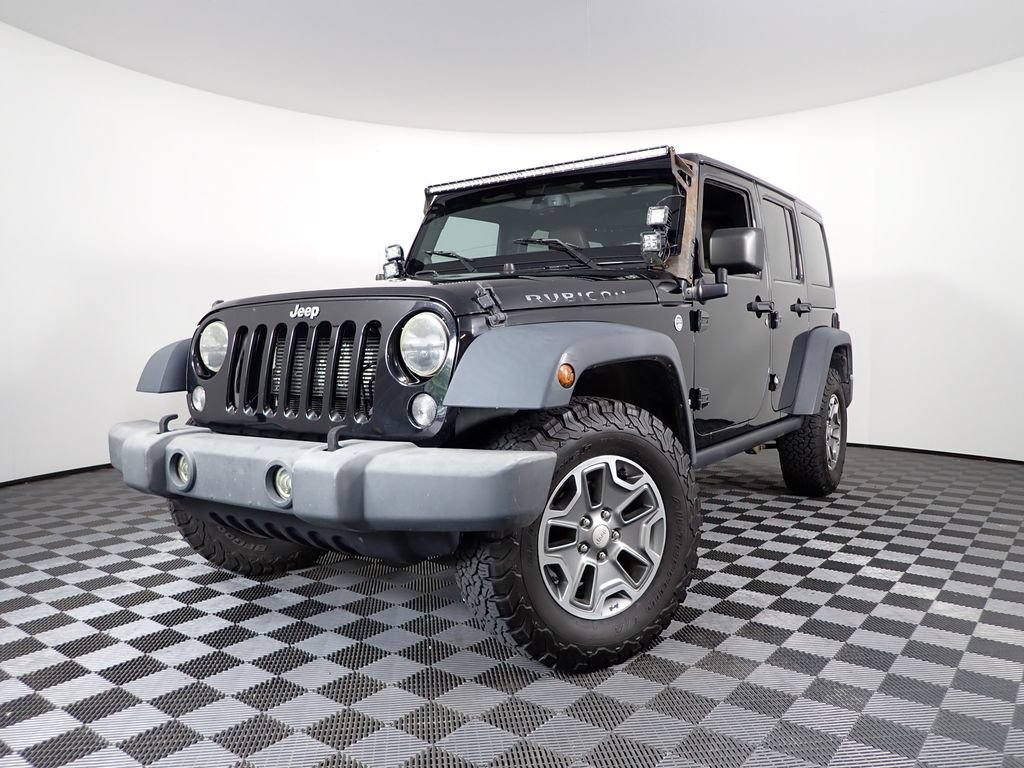 Used 2014 Jeep Wrangler Unlimited Rubicon with VIN 1C4BJWFG4EL145660 for sale in Logan, OH