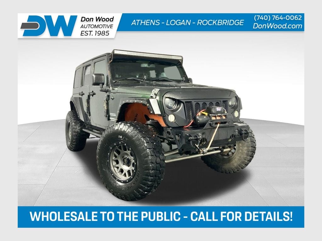 Used 2011 Jeep Wrangler Unlimited Sport with VIN 1J4BA3H17BL592996 for sale in Athens, OH