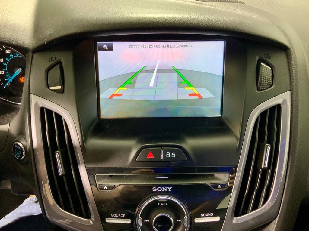 Used 2014 Ford Focus Titanium with VIN 1FADP3J26EL316478 for sale in Athens, OH