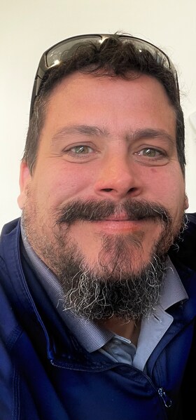 Staff member Trev Oliver from ID_417a4d59d8d1