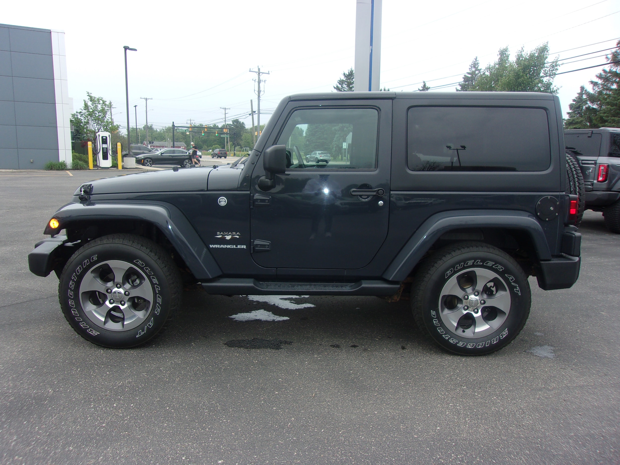 Certified 2017 Jeep Wrangler Sahara with VIN 1C4GJWBG8HL518697 for sale in South Haven, MI
