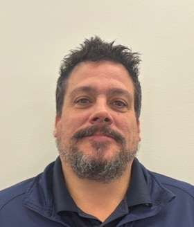 Staff member Trev Oliver  from ID_d495d5e8f3c7