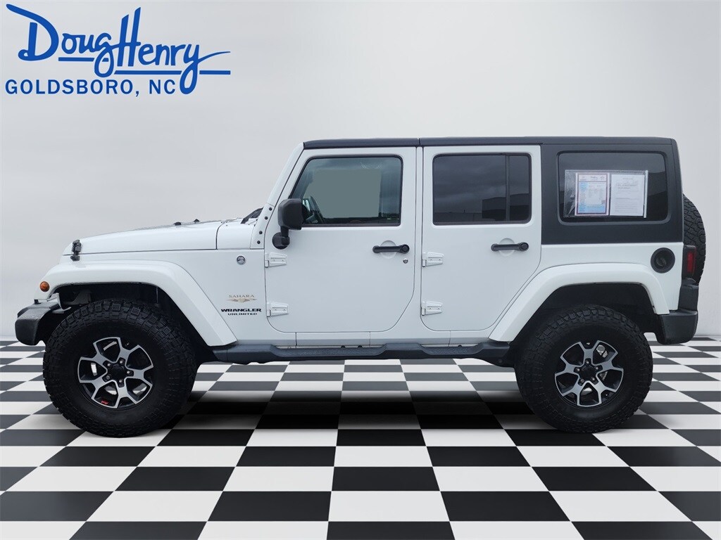 Used 2015 Jeep Wrangler Unlimited Sahara with VIN 1C4BJWEG9FL750017 for sale in Ayden, NC