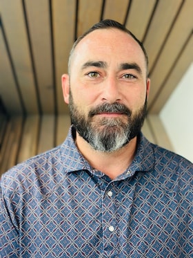 Staff member Conrad Corby  from ID_ee10226947fb